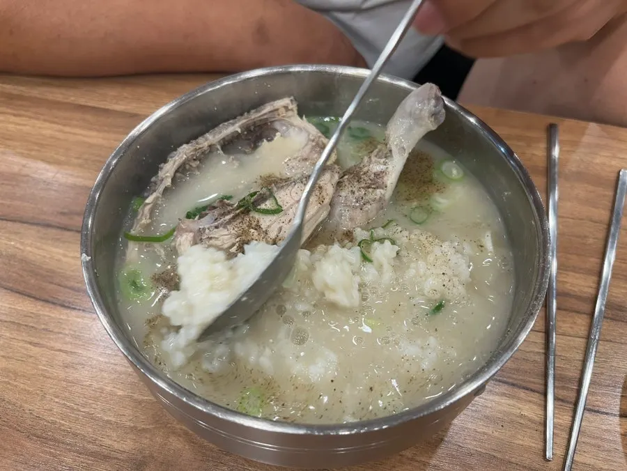 A steaming bowl of dak kalguksu