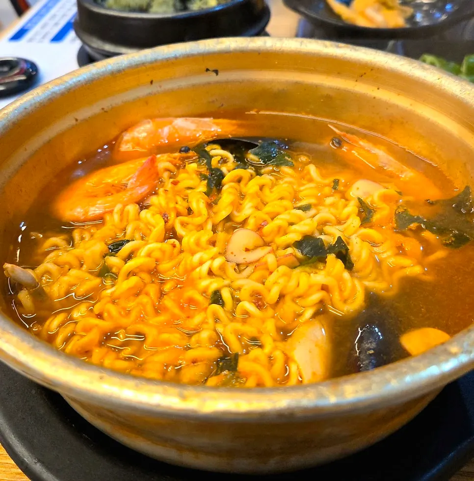 A bowl of seafood ramen ordered as a meal
