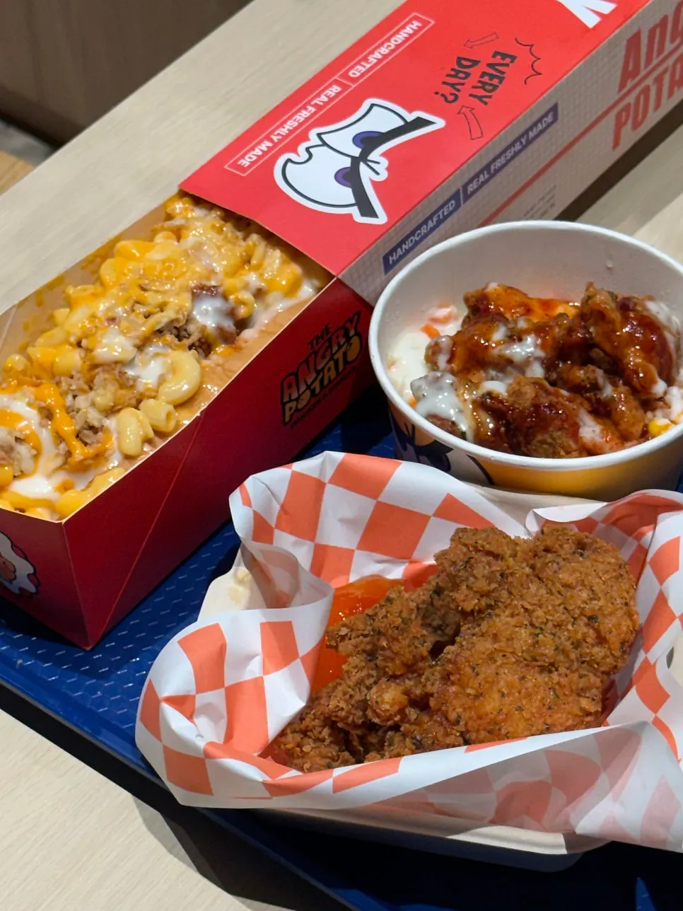 Our order of hot dog, rice bowl, chicken and potatoes