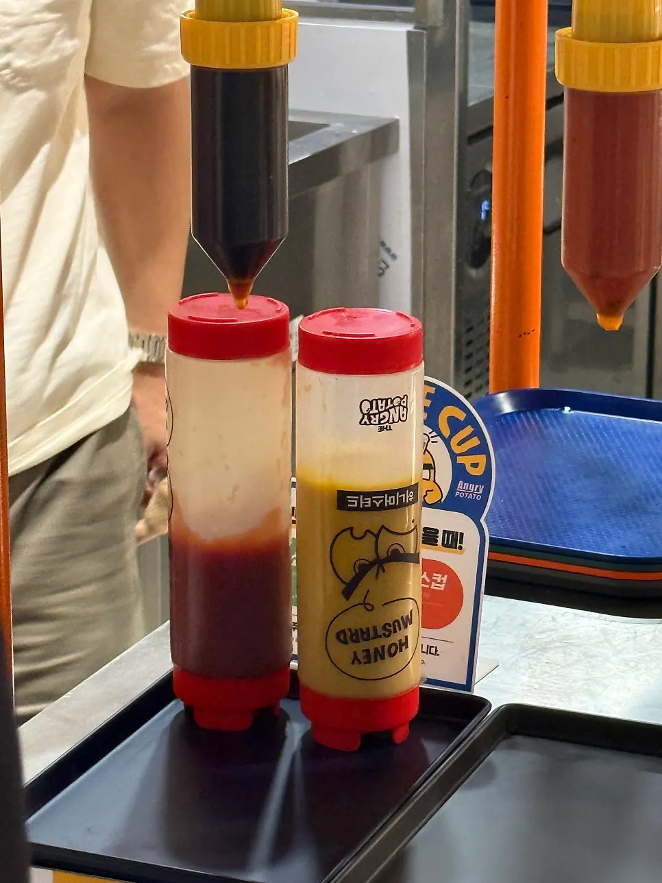 Free sauce corner at one side of the store