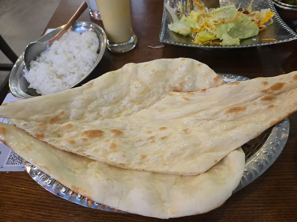 Large, warm butter naan