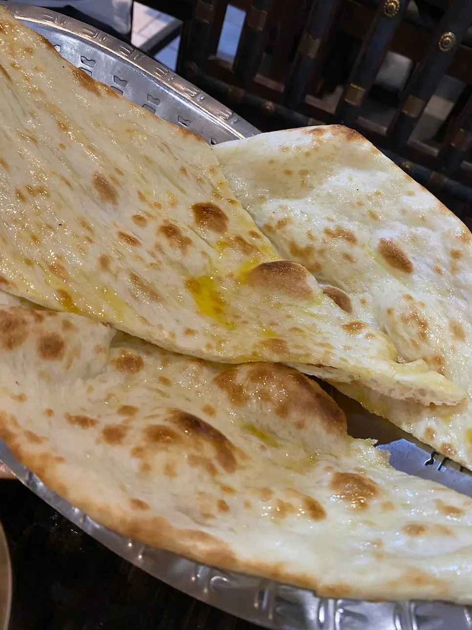 Butter naan glistening with butter