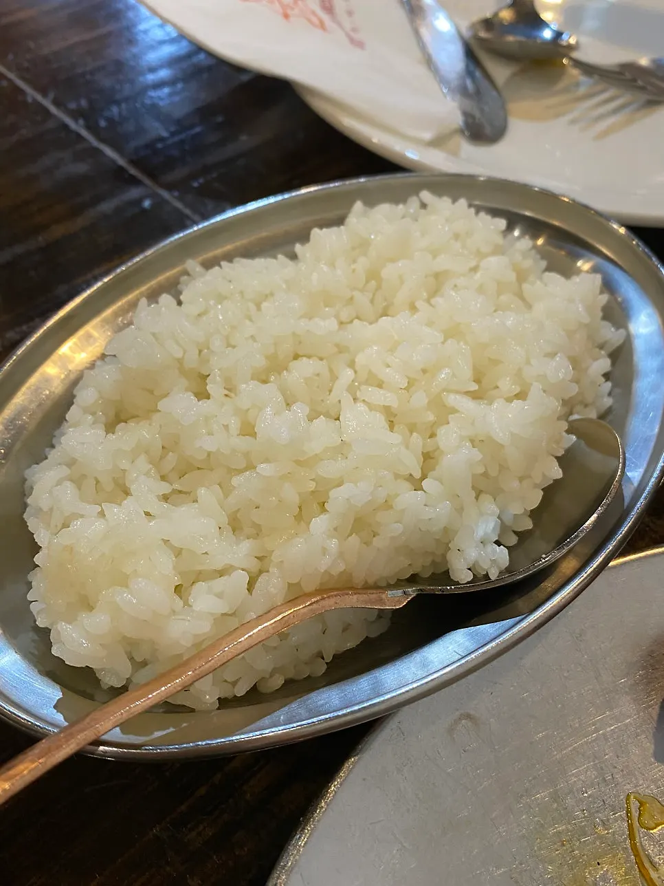 A single serving of plain rice with regular rice
