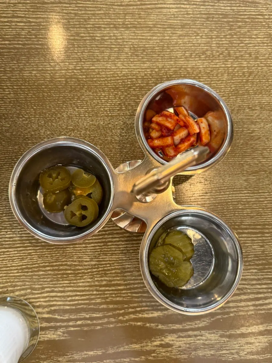 Three basic side dishes: kimchi, jalapeños, and pickles