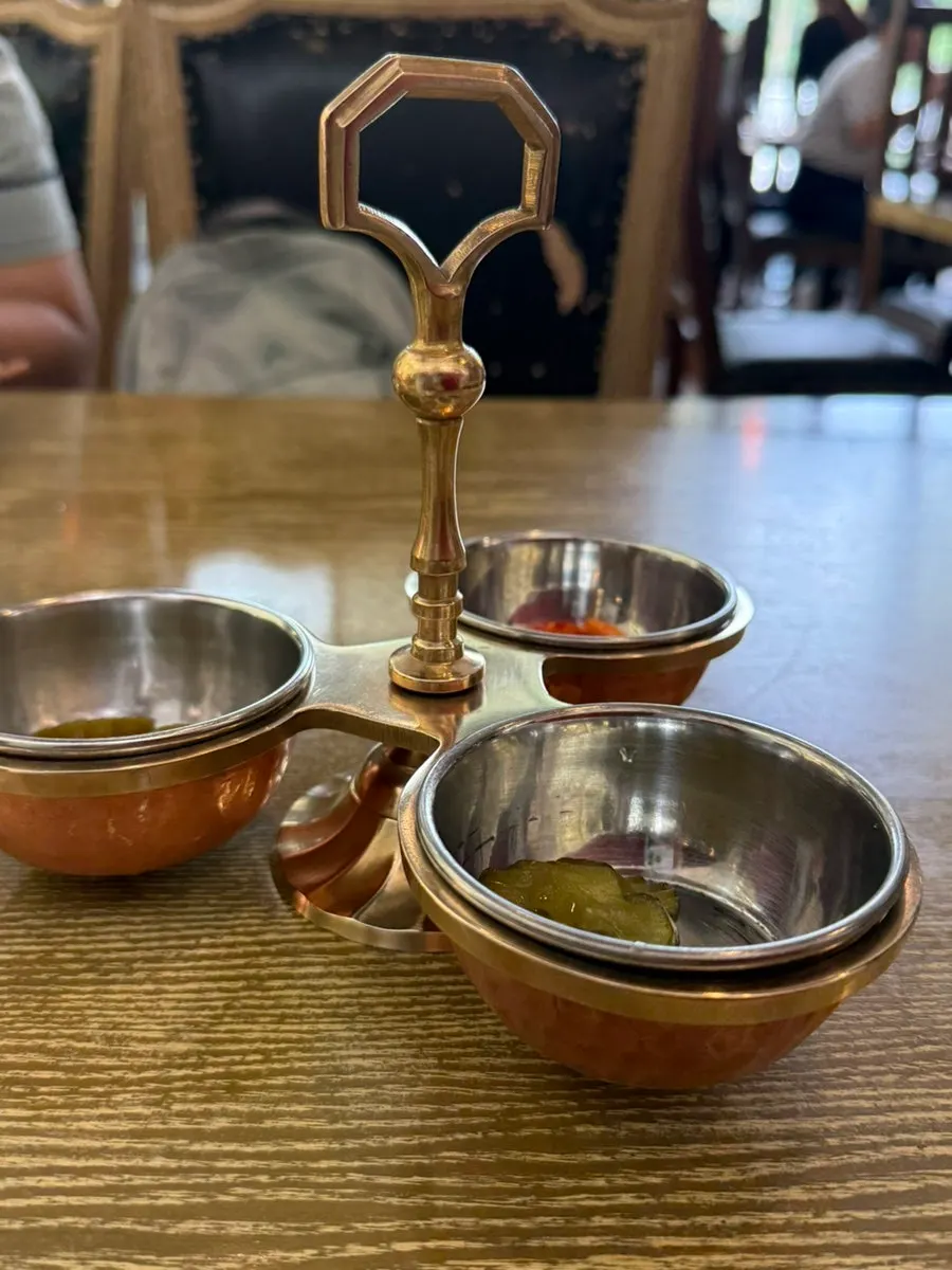 Pickled side dishes served in a metal bowl