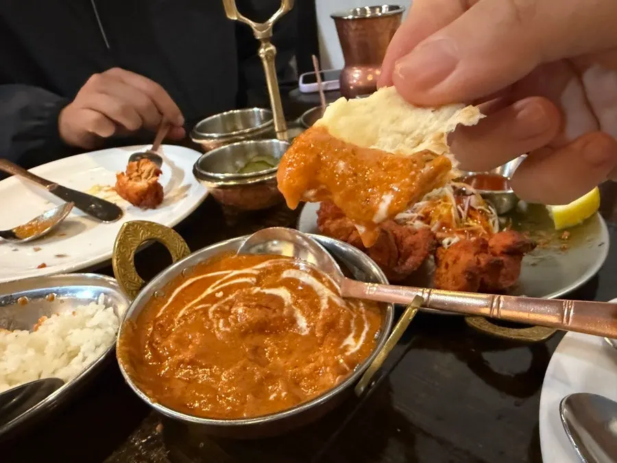 Butter chicken curry served over rice