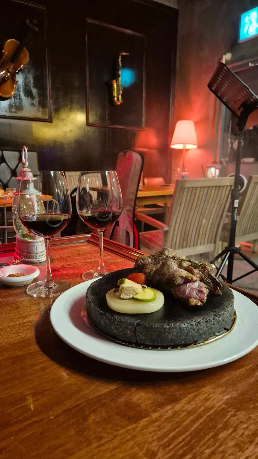 Stone steak cooked on a hot stone plate