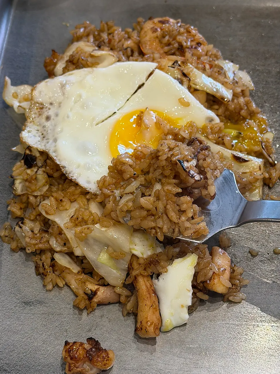 Yaki fried rice topped with a soft-fried egg