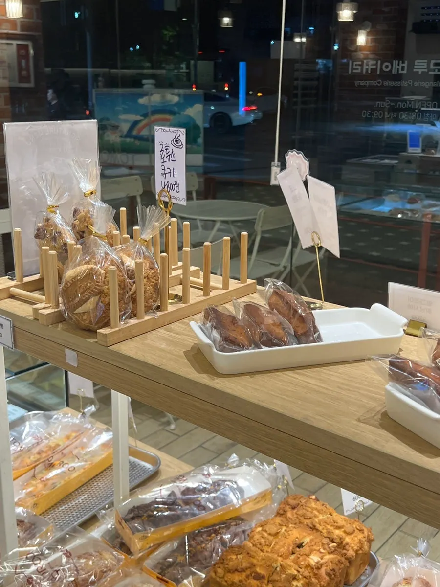 Interior view of customers choosing bread