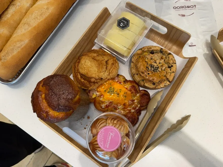 Interior of Tomoru Bakery with master baker's awards on display