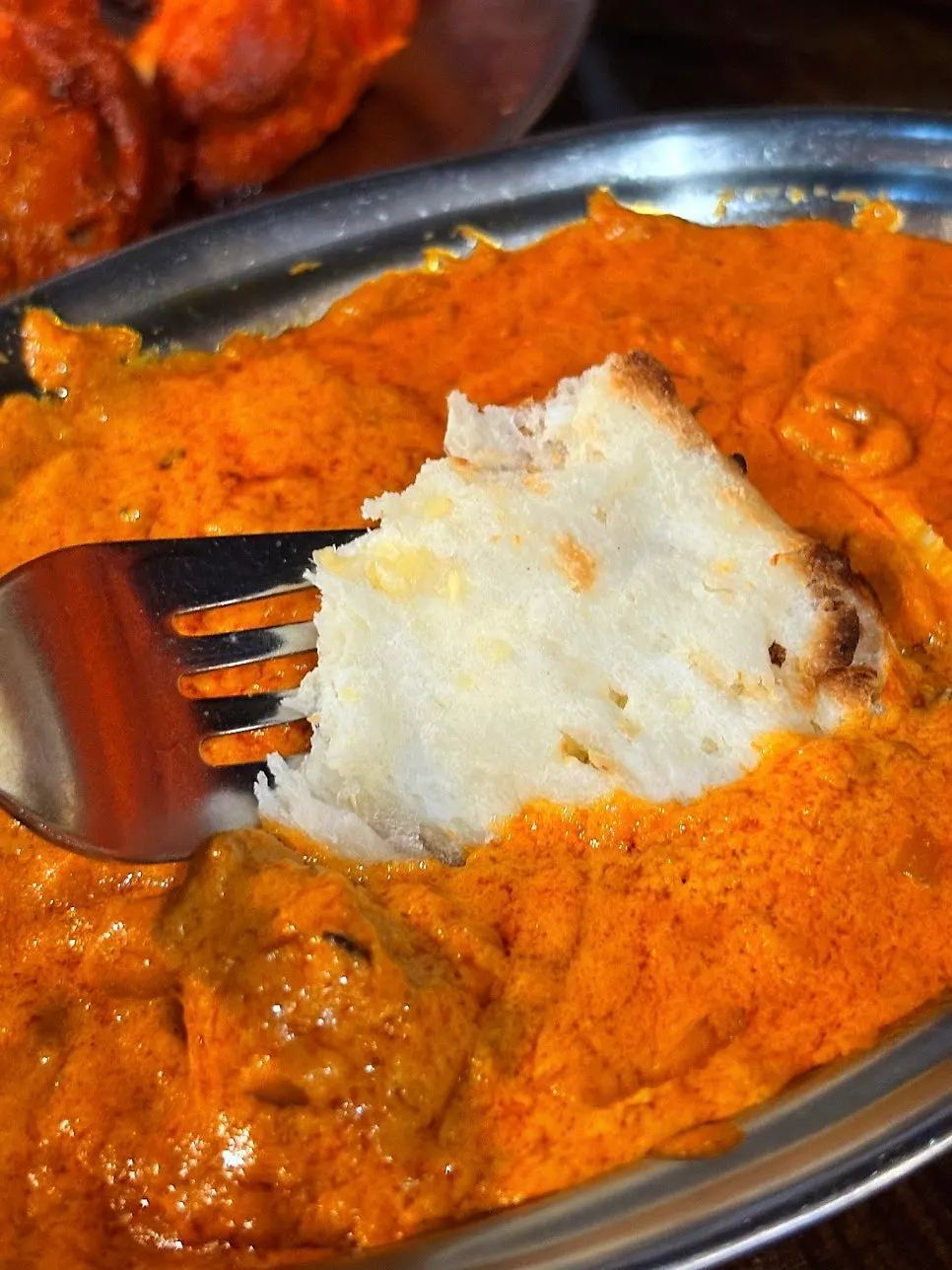 Curry spooned over basmati rice