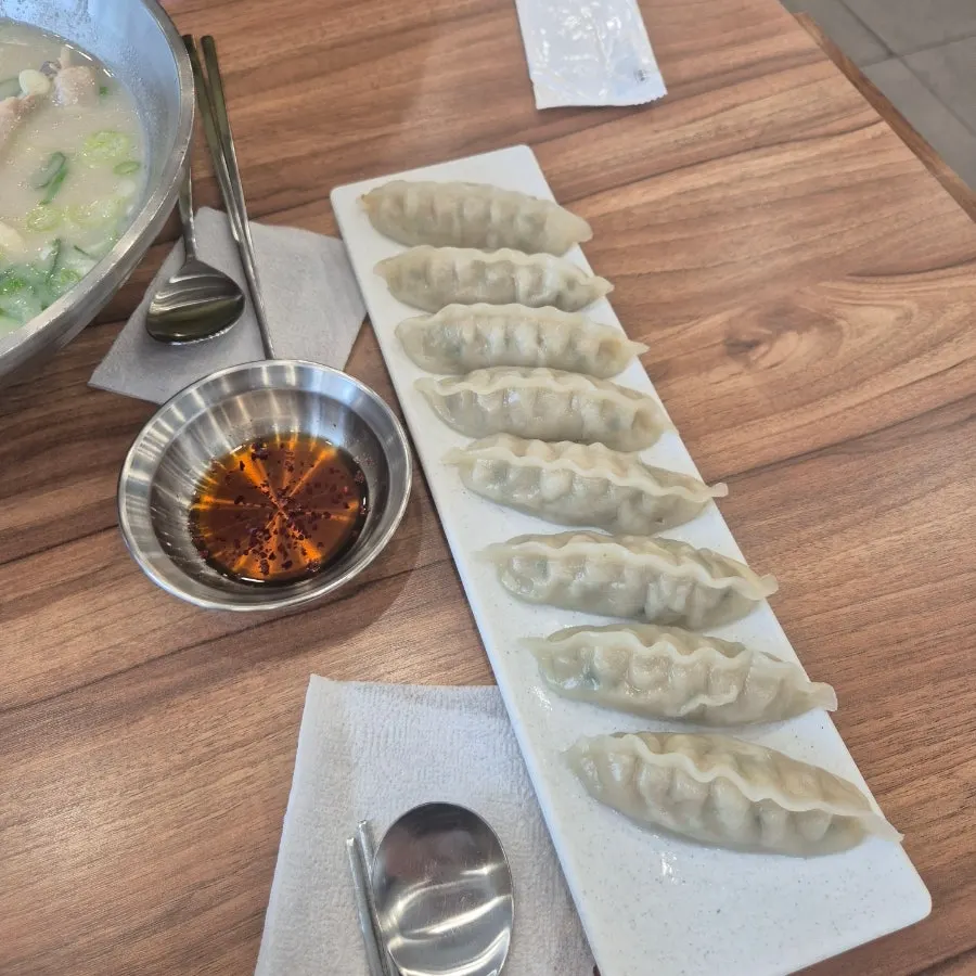 Chewy mandu cut in half showing the filling