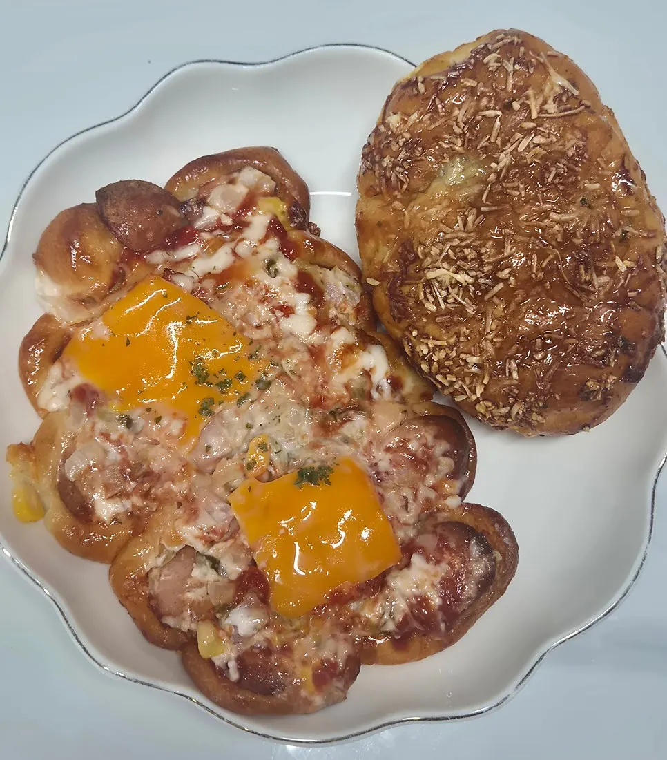 Autumn leaf pizza bread and garlic cheese salt bread pulled from the bag