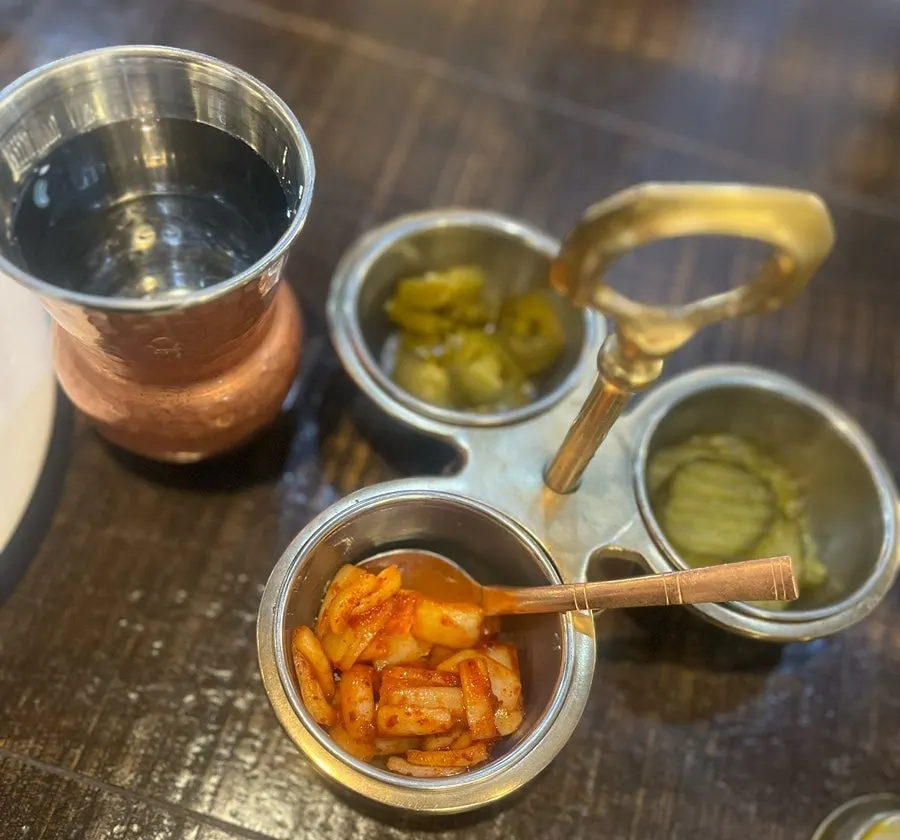 Butter chicken and mutton do piaja placed on the table