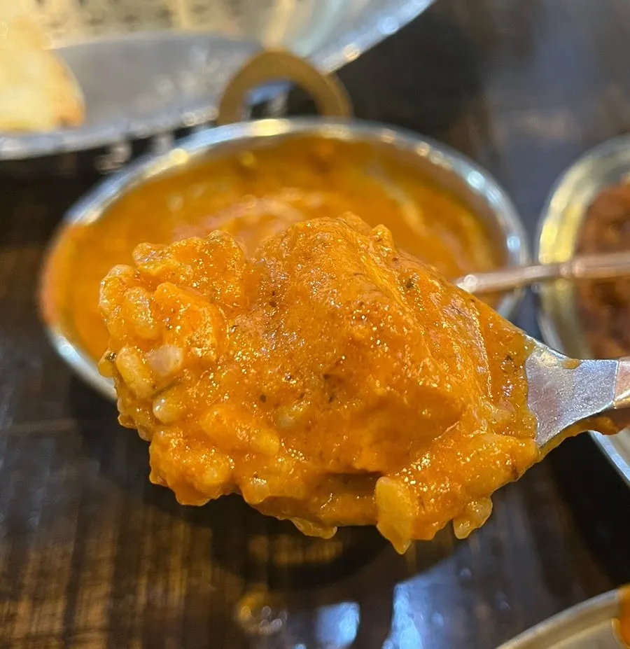 Tender chicken topped with butter chicken sauce