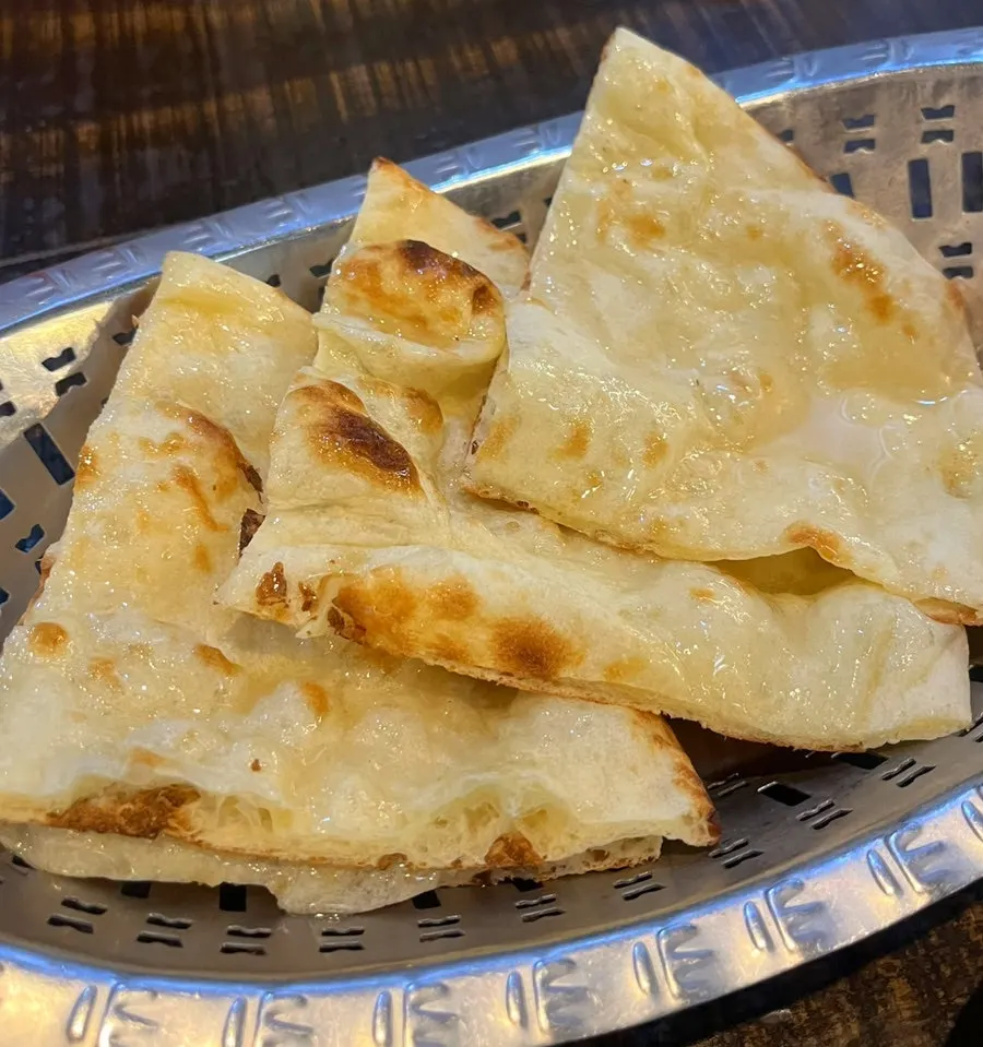 Sweet naan fresh out of the tandoor