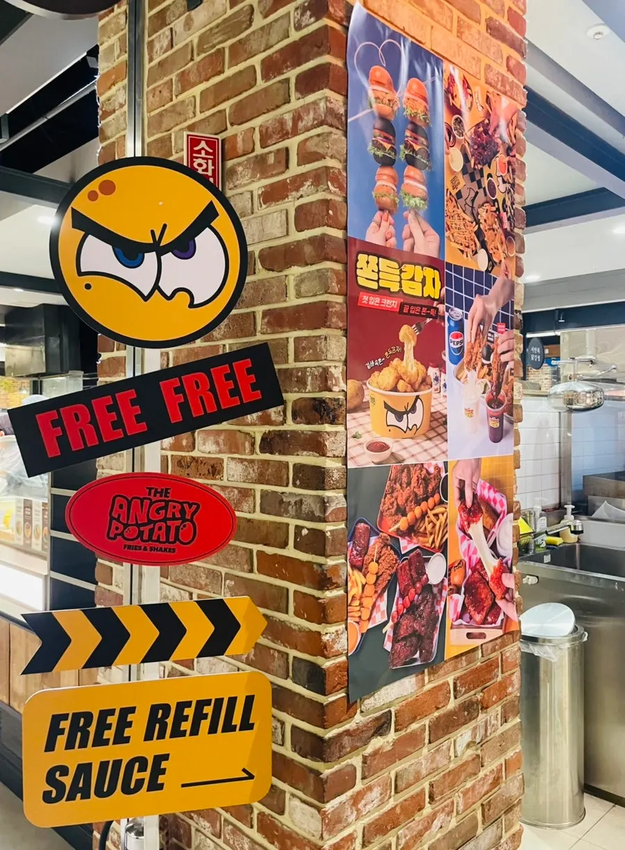 Angry Potato store entrance located in front of the food court