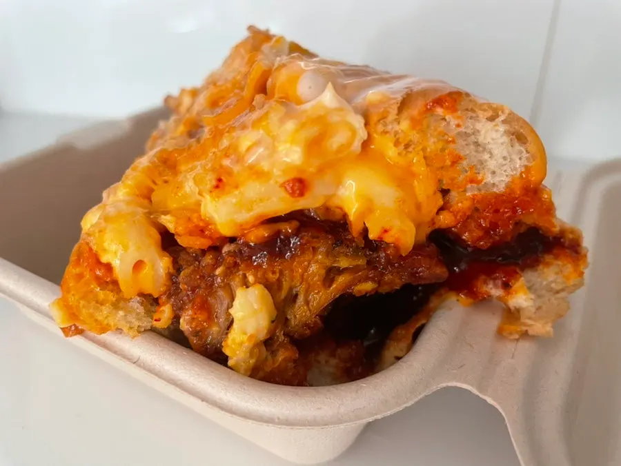 Cross-section of the big crunch hot dog, packed to go and cut in half