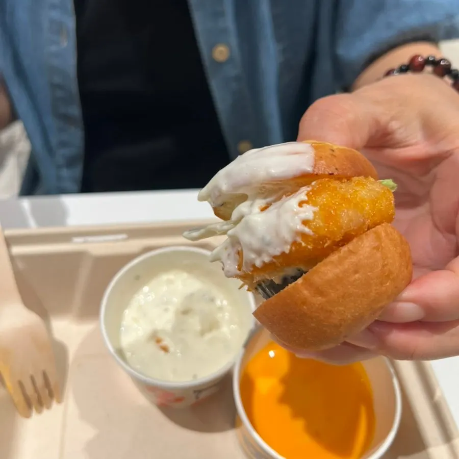 Mini burgers threaded onto a skewer