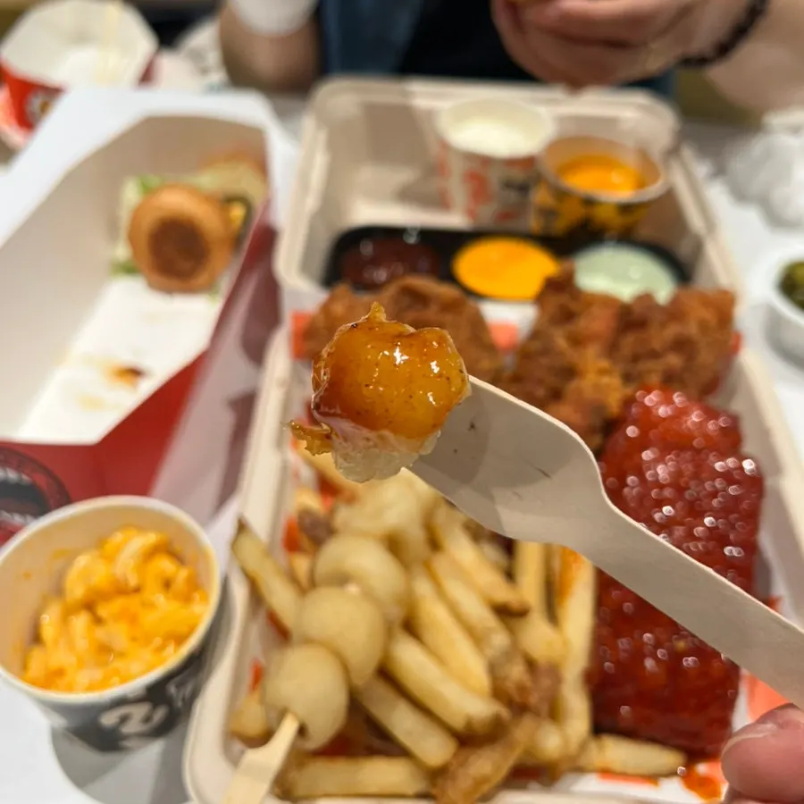 3-cup sauce set alongside fries