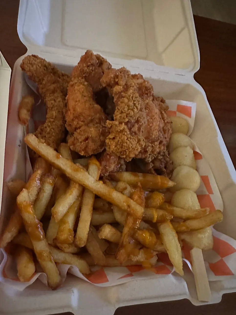 Crispy fries being picked up one by one
