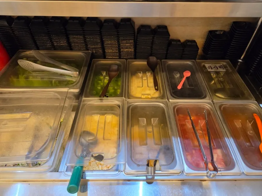 Self-serve bar with refillable side dishes