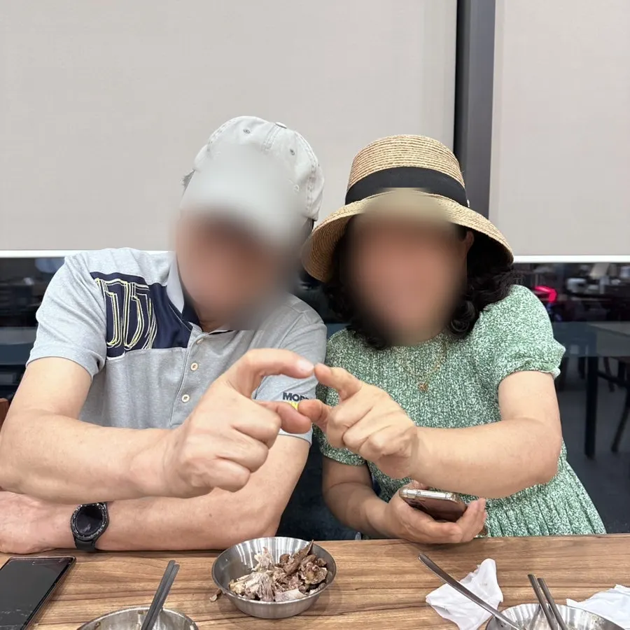 手ハートに失敗した両親の写真