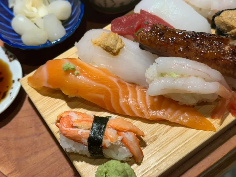 Thick, long slices of salmon sushi
