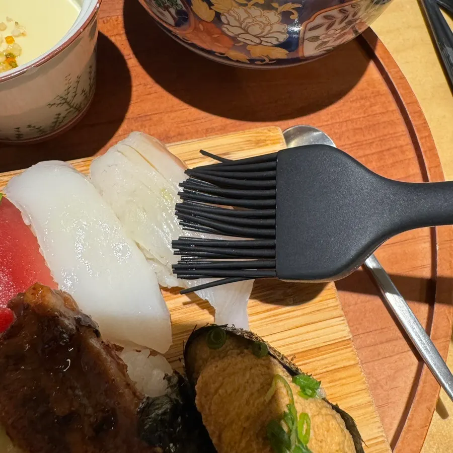 Sushi paired with soy sauce and wasabi