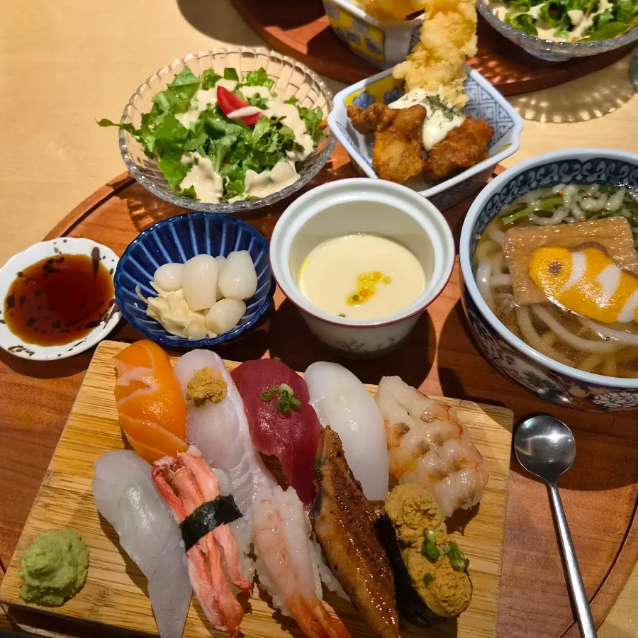 Sushi lineup including crab meat and ankimo