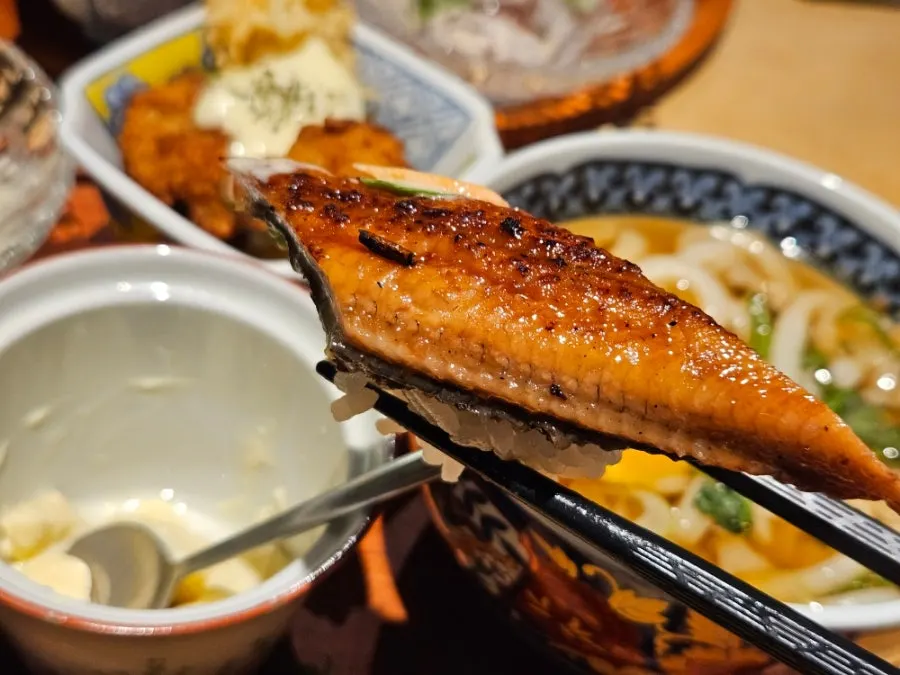 A plate with various types of sashimi sushi