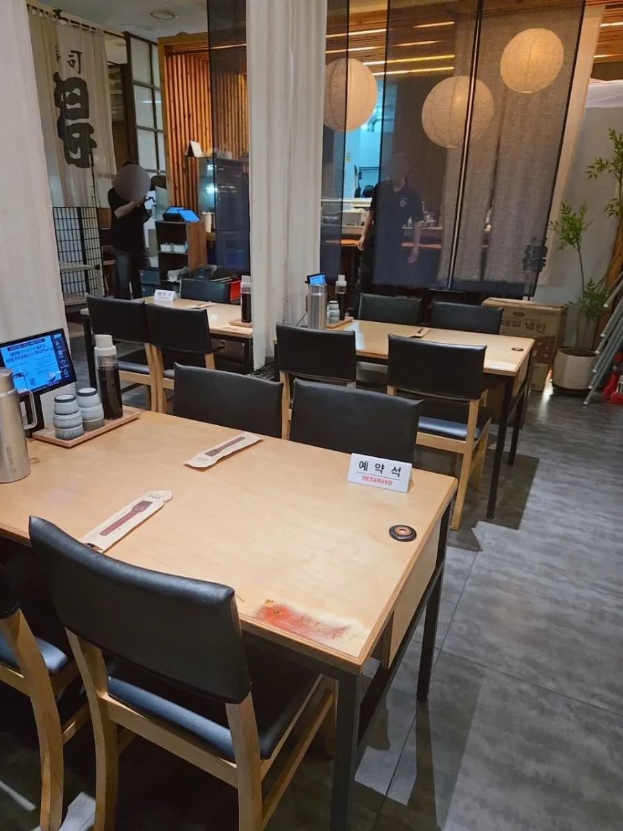 Sushi Doku entrance with an umbrella stand