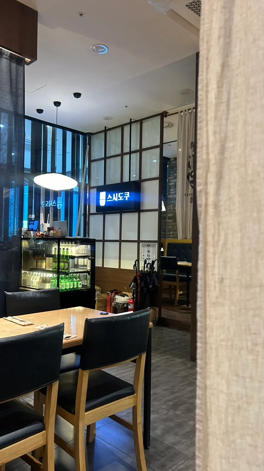 Curtain-divided seating at Sushi Doku The Songdo