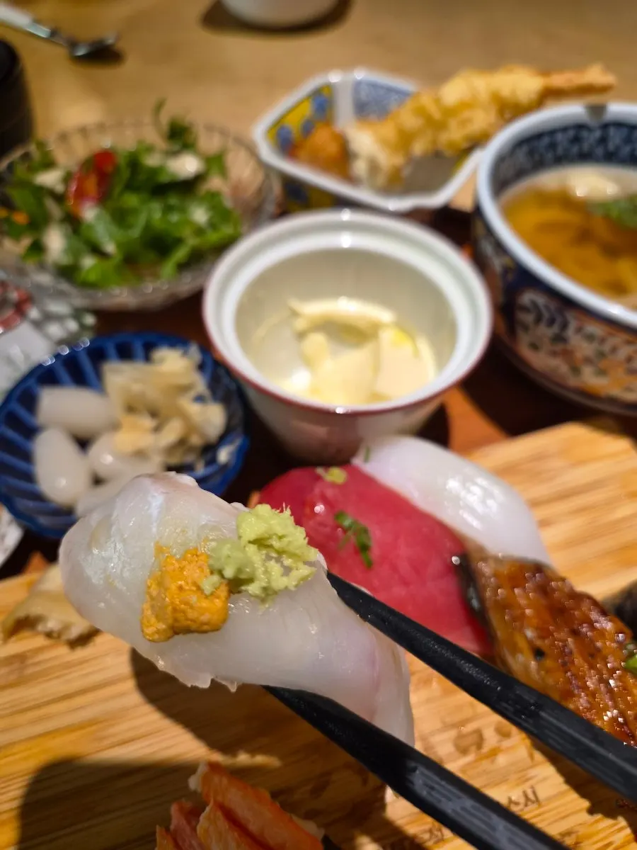 Sushi served with side dishes