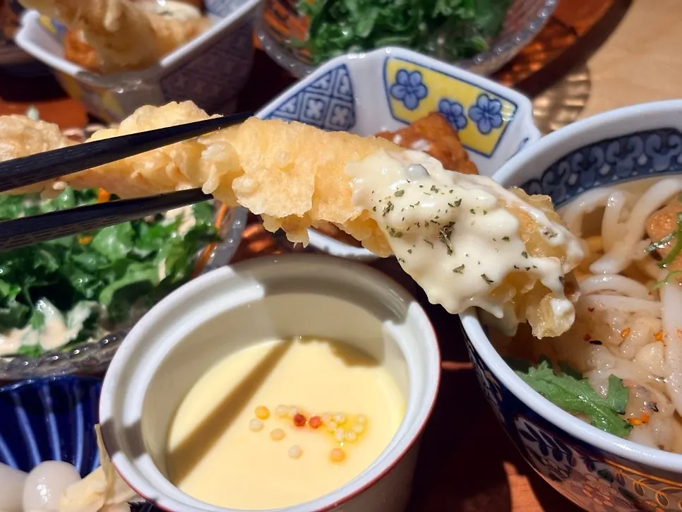 Fried shrimp topped with tartar sauce