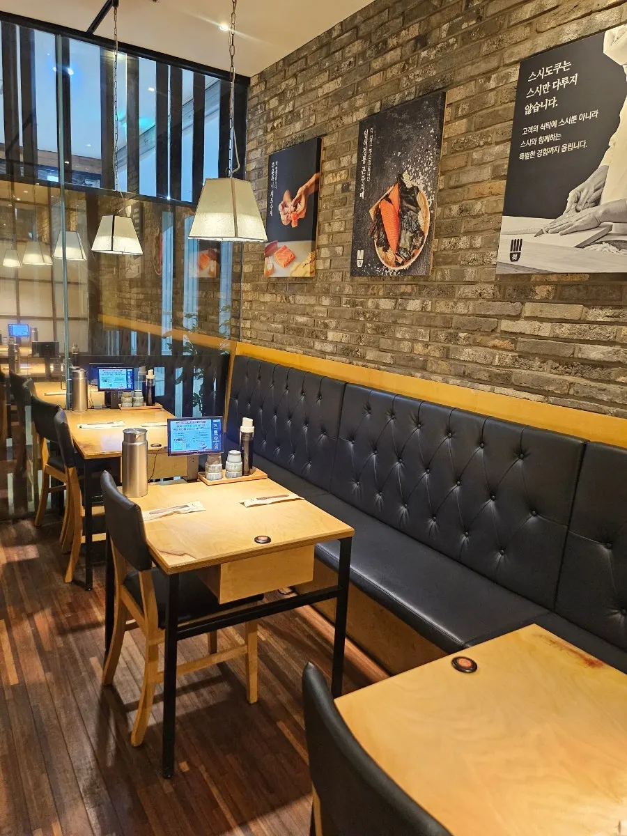 Curtained table seating at Sushi Doku The Songdo