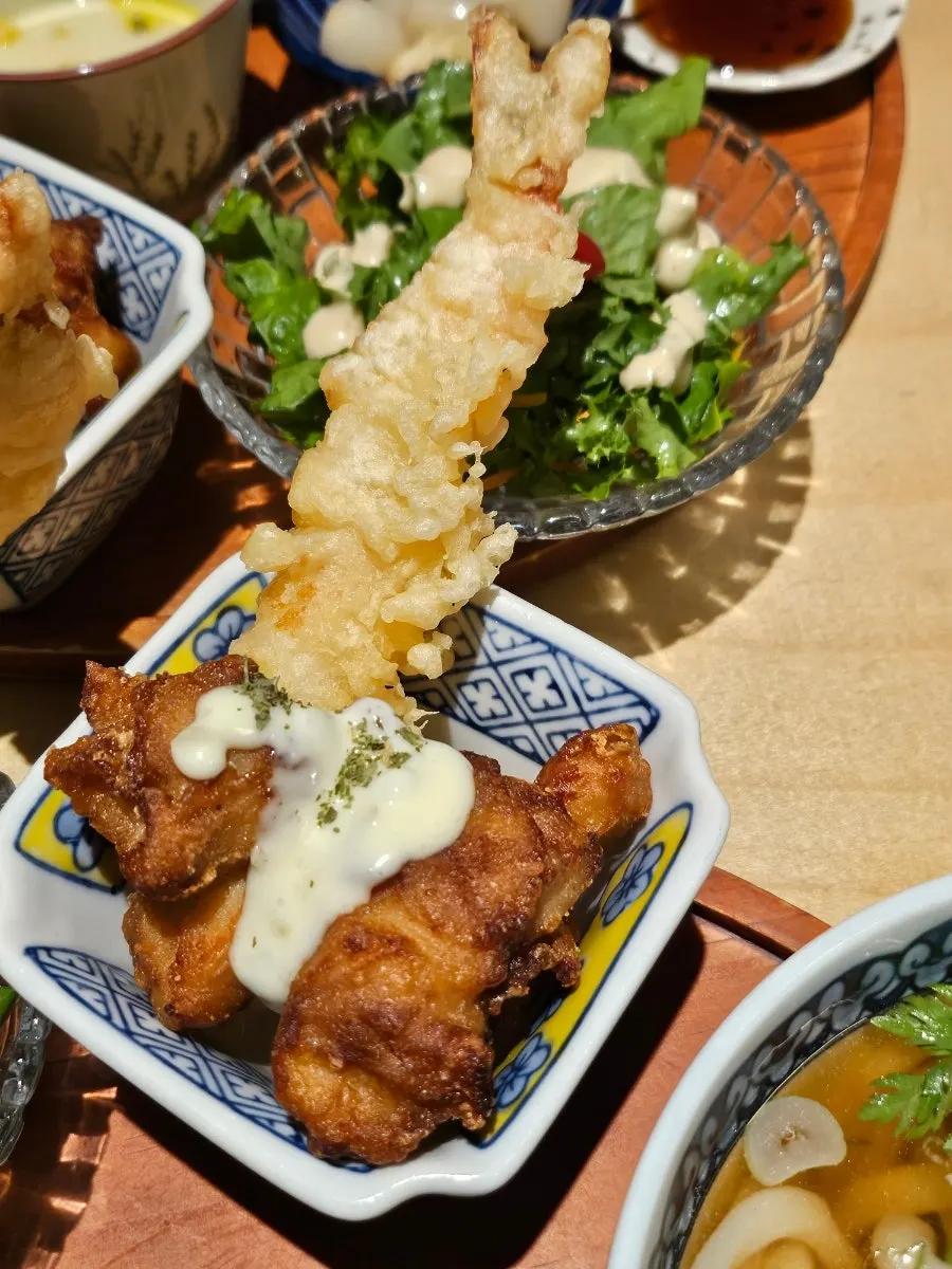 Salad with mayo sauce and side dishes