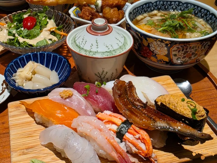 Full spread of the premium sushi set including sides