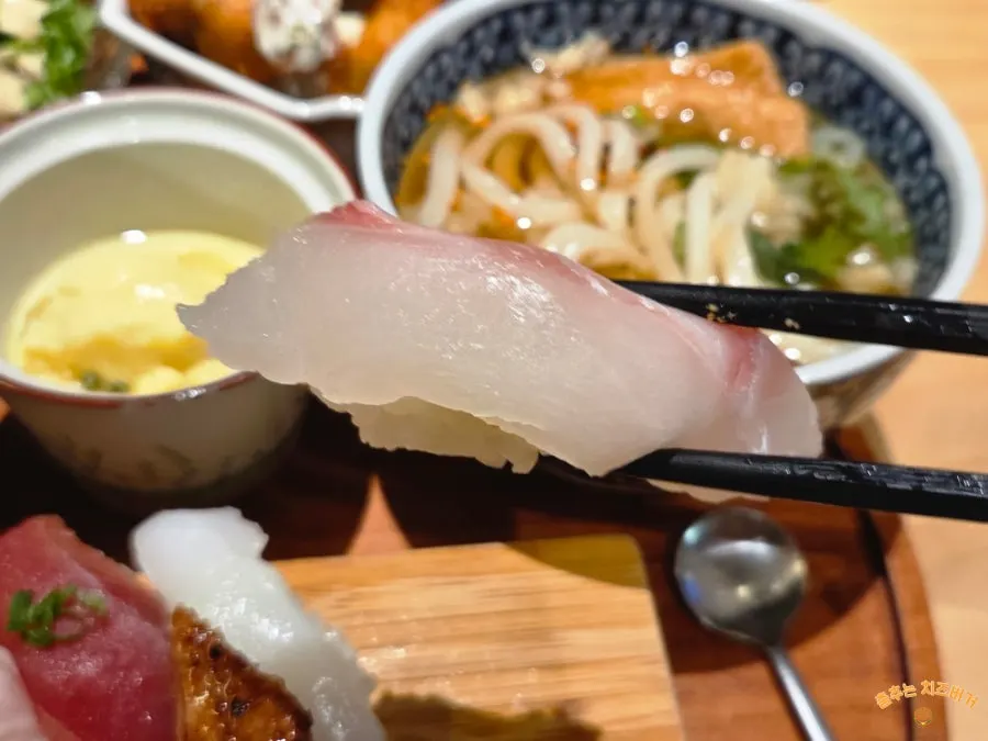 A piece of white fish sushi