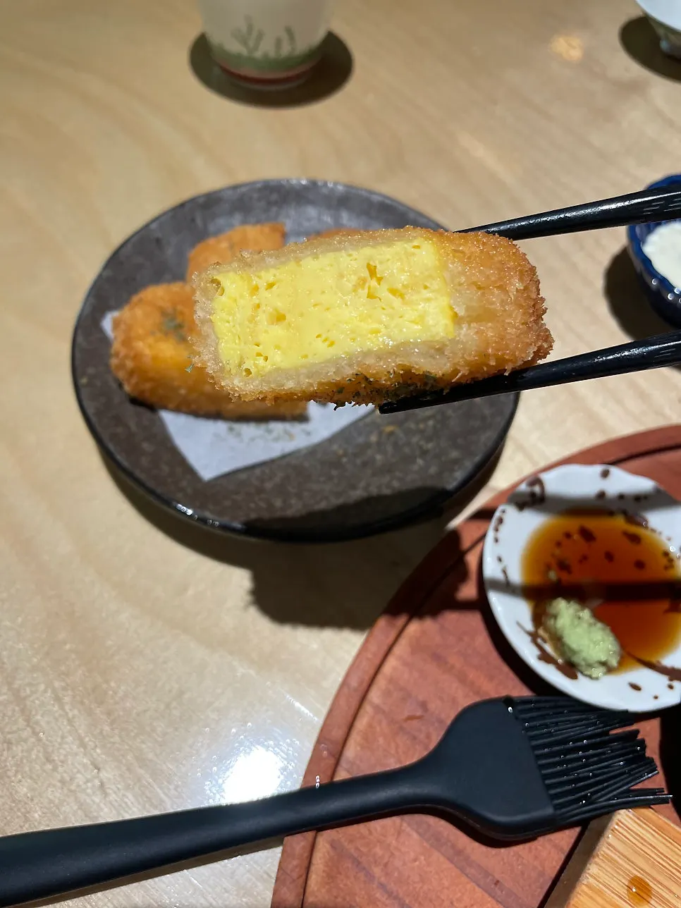 Sushi served with savory soy sauce