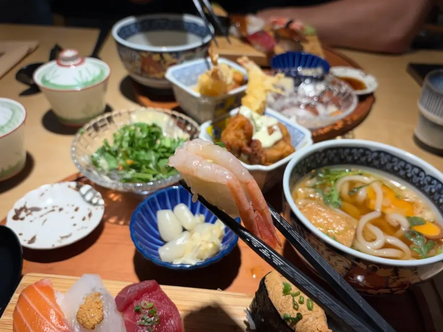 Sushi topped with real steamed snow crab meat