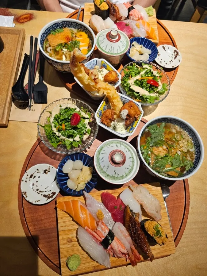 Premium Sushi Set table spread with 10 kinds of sushi and sides