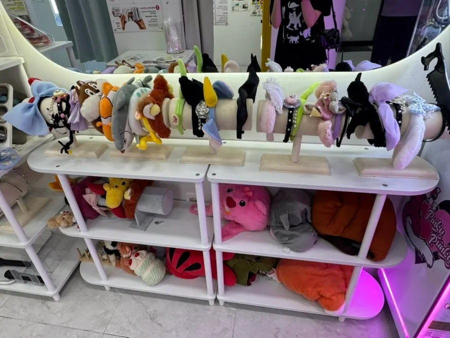 Display of character and animal-shaped headband props