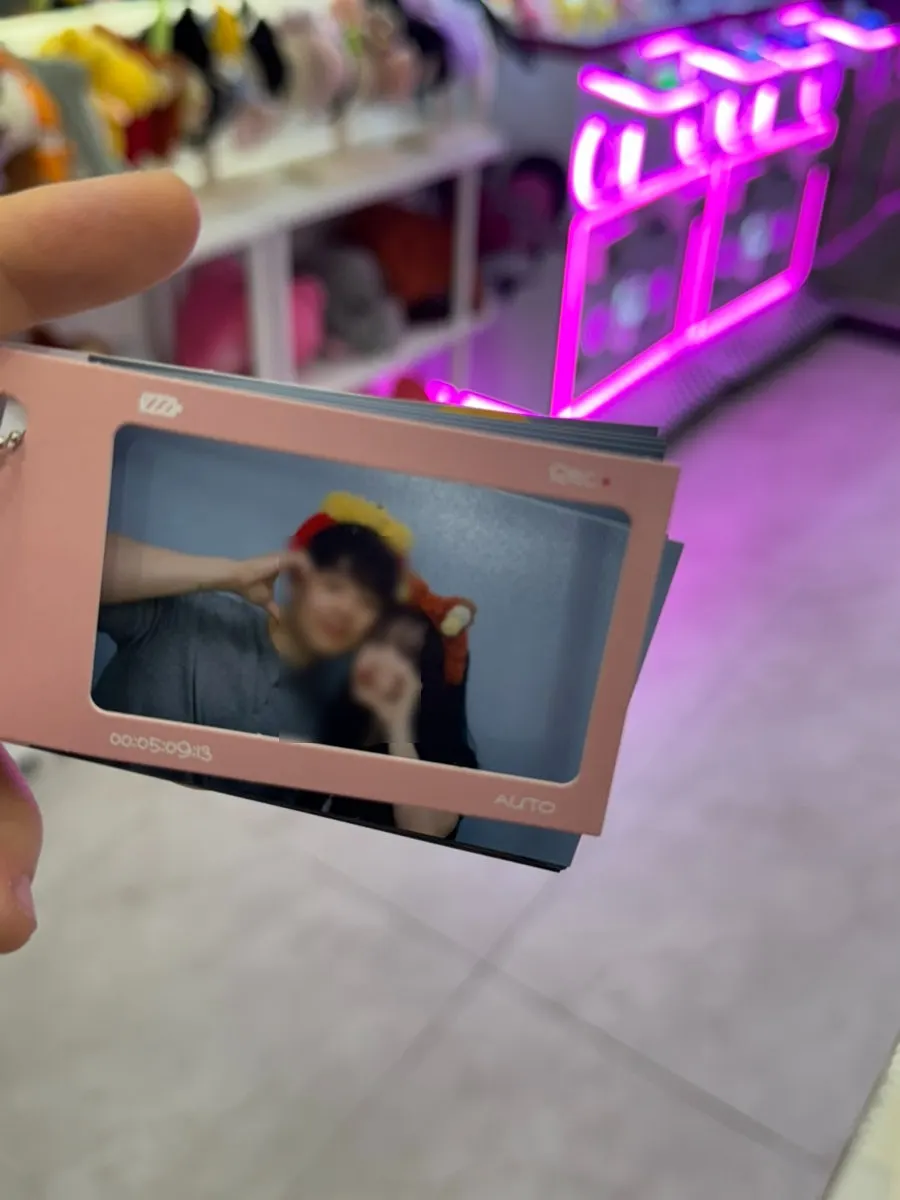 Finished moving photo book with a pink cover frame