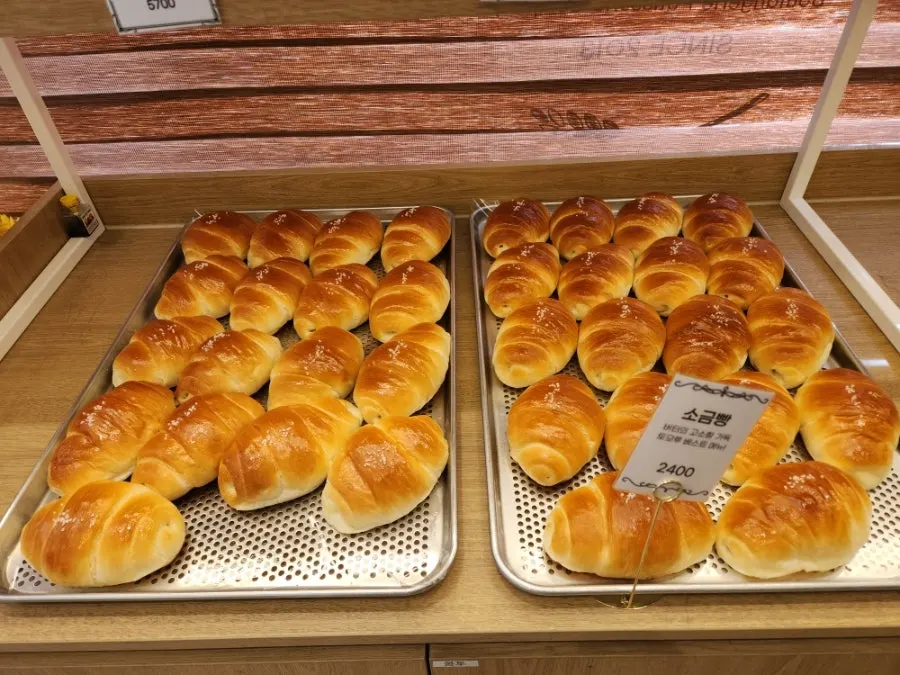 Baguette display case at Tomoru Bakery