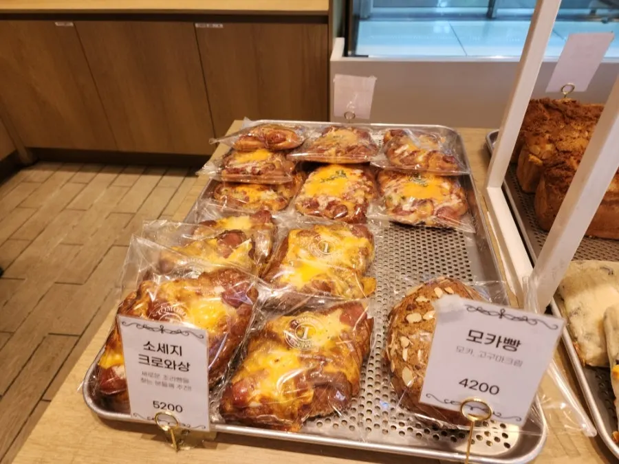 Sausage croissant and mocha bread on display