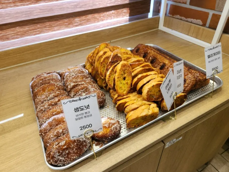 Fresh donuts and garlic bread on display