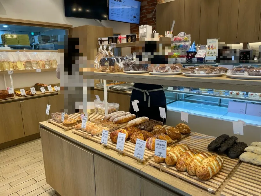 Various types of bread on display at Tomoru Bakery