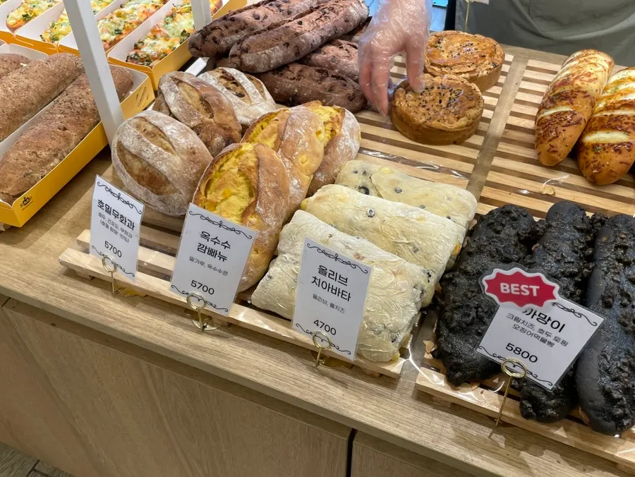 Sandwiches and bread on display at Tomoru Bakery