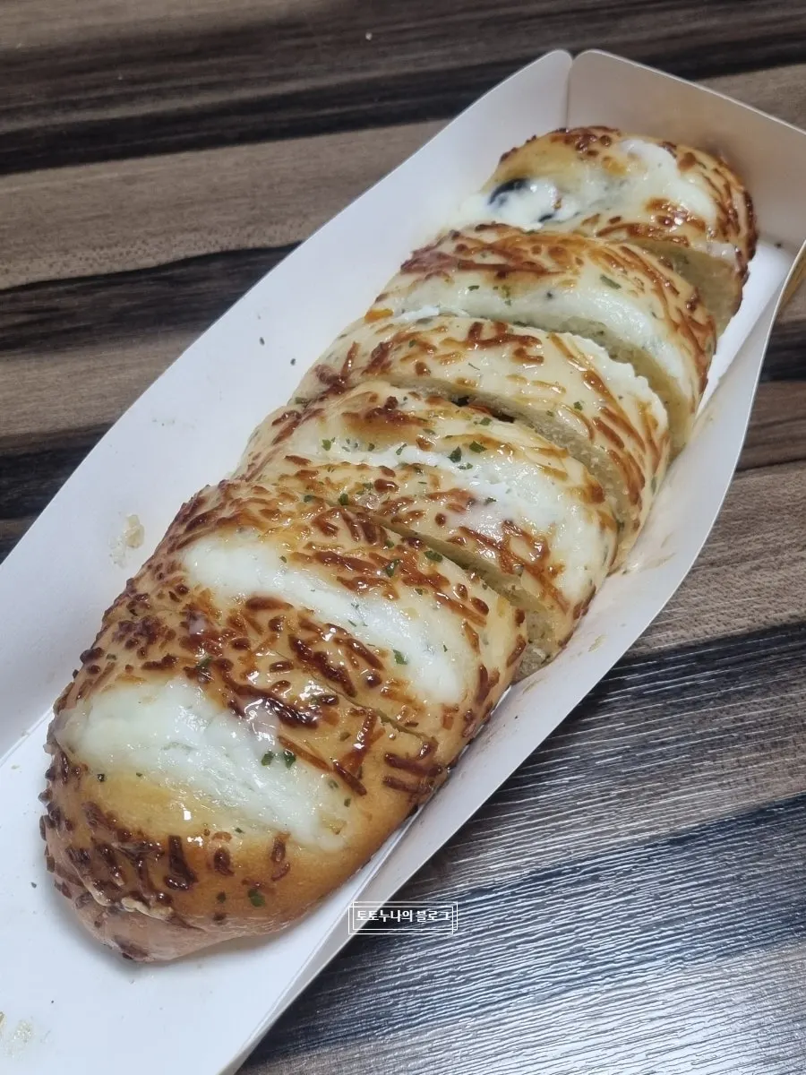 Basil tomato bread topped with cream cheese